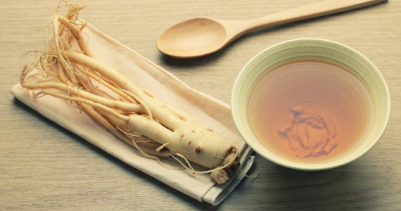 Close up of ginseng root and broth